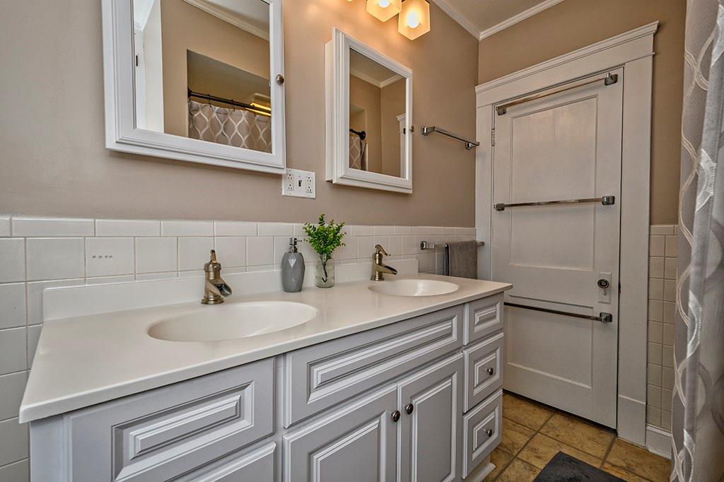 1623 Ridge Avenue Coraopolis, PA 15108 - Photo 23 of 25 This updated full bath finishes off the 2nd floor. New double bowl vanity, faucets, mirrors, lighting and shower complete this room.