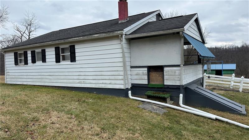 89 State Rte 908 Extension Tarentum, PA 15084 - Photo 3 of 48 a view of a house with a balcony