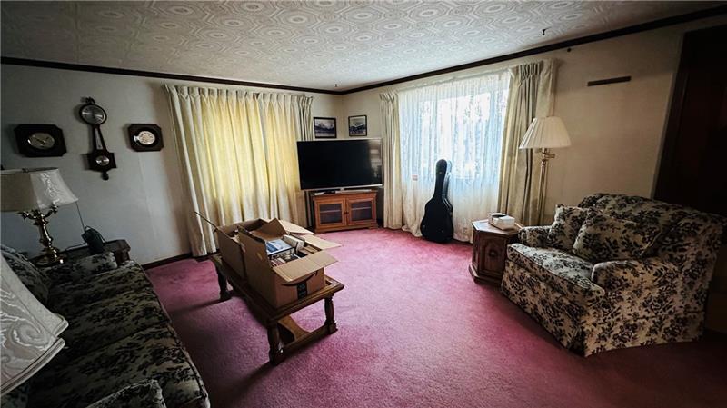 89 State Rte 908 Extension Tarentum, PA 15084 - Photo 32 of 48 a living room with furniture and a flat screen tv