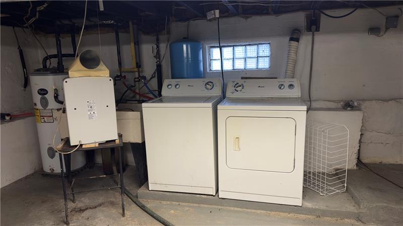 89 State Rte 908 Extension Tarentum, PA 15084 - Photo 38 of 48 a utility room with dryer and washer