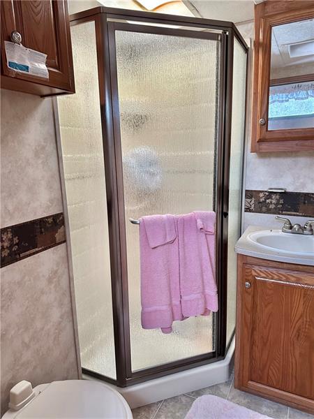 89 State Rte 908 Extension Tarentum, PA 15084 - Photo 44 of 48 a bathroom with a bathtub and a shower