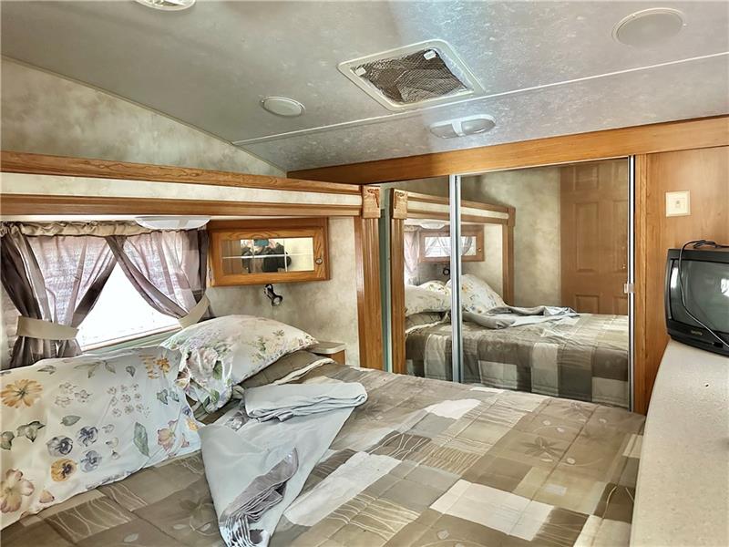89 State Rte 908 Extension Tarentum, PA 15084 - Photo 45 of 48 a large bedroom with a bed and wooden floor
