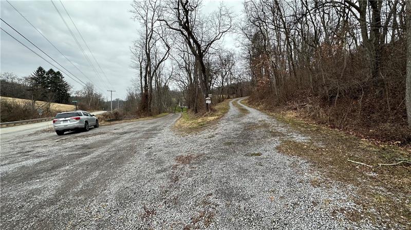 89 State Rte 908 Extension Tarentum, PA 15084 - Photo 7 of 48 a view of road with large trees