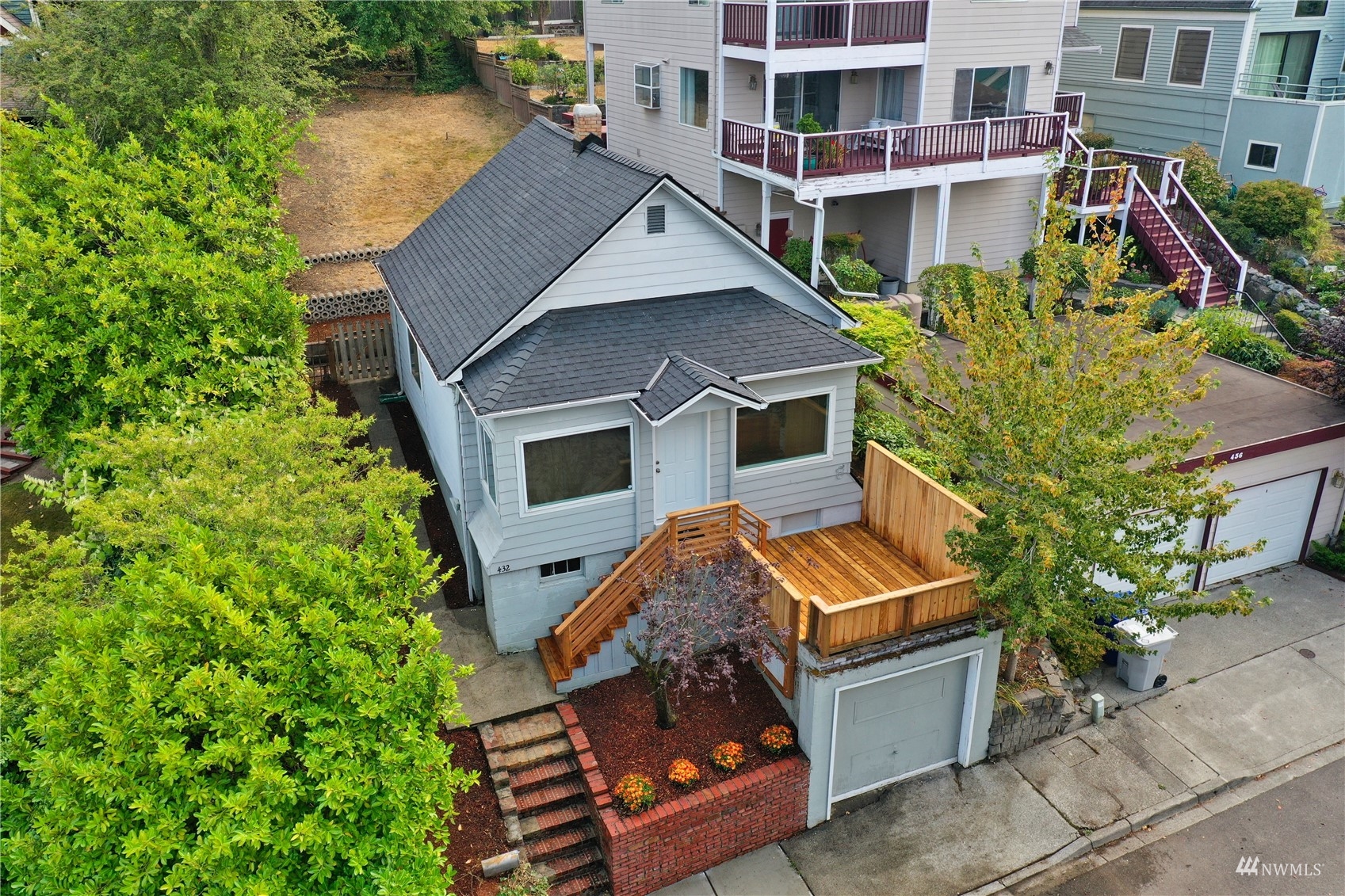 432 Cedar Avenue South Renton, WA 98057 - Photo 2 of 38 an aerial view of a house with a yard and potted plants