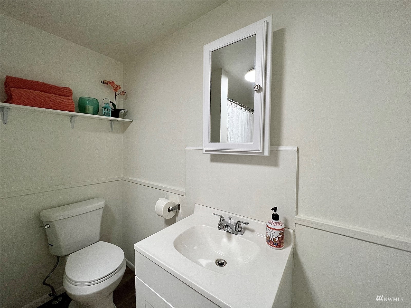 432 Cedar Avenue South Renton, WA 98057 - Photo 27 of 38 a white toilet sitting next to a bathroom sink