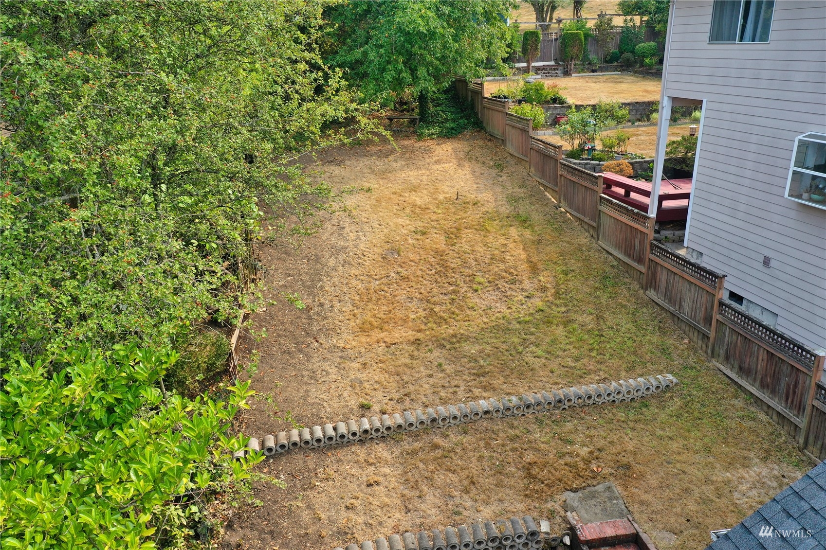 432 Cedar Avenue South Renton, WA 98057 - Photo 33 of 38 a view of a yard with an outdoor seating
