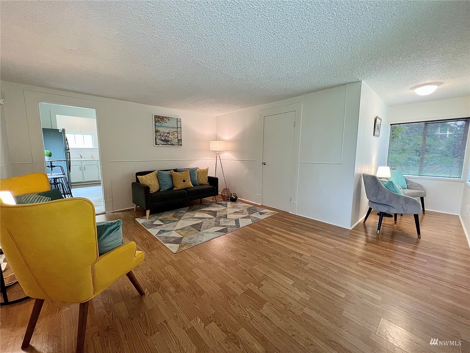 432 Cedar Avenue South Renton, WA 98057 - Photo 9 of 38 a bedroom with a bed and a chair