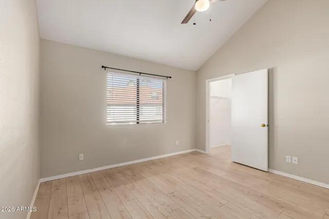 an empty room with a empty space and a window