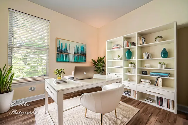a kitchen with a sink stove cabinets and refrigerator
