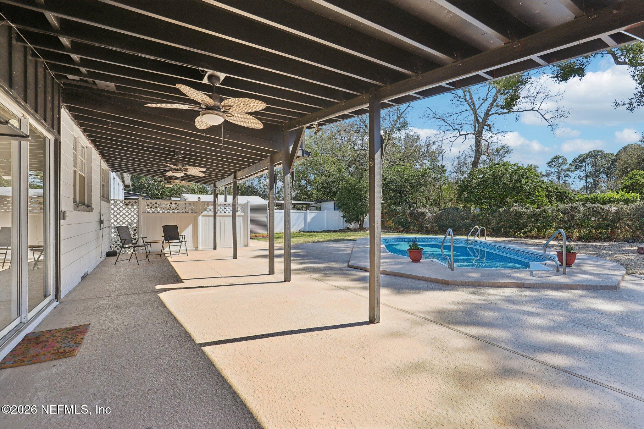 7004 Waikiki Road Jacksonville, FL 32216 - Photo 17 of 41 a view of a backyard