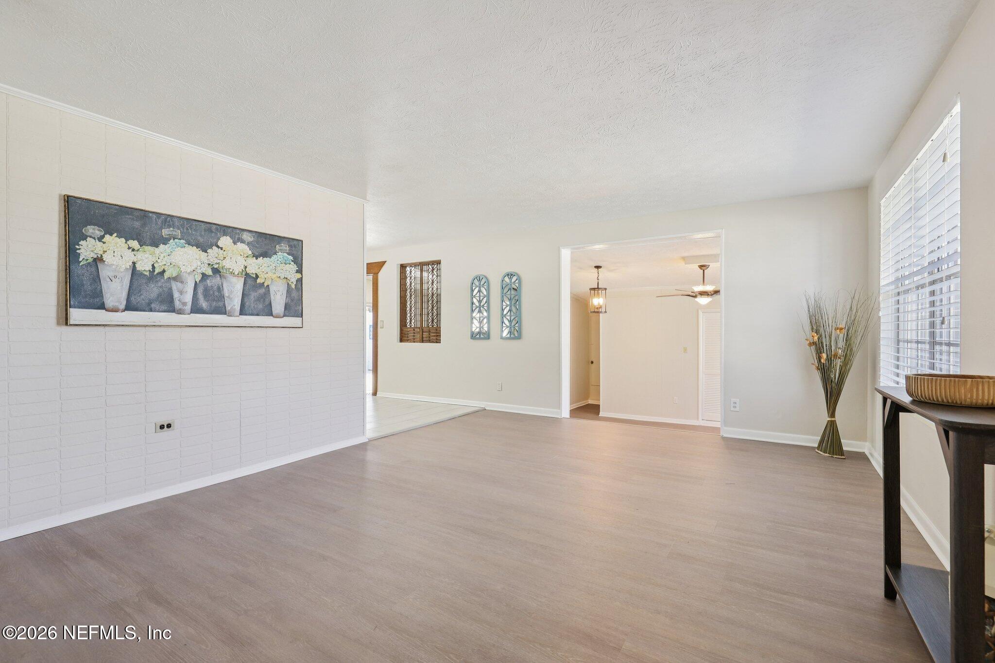 7004 Waikiki Road Jacksonville, FL 32216 - Photo 23 of 41 a view of an empty room with a window