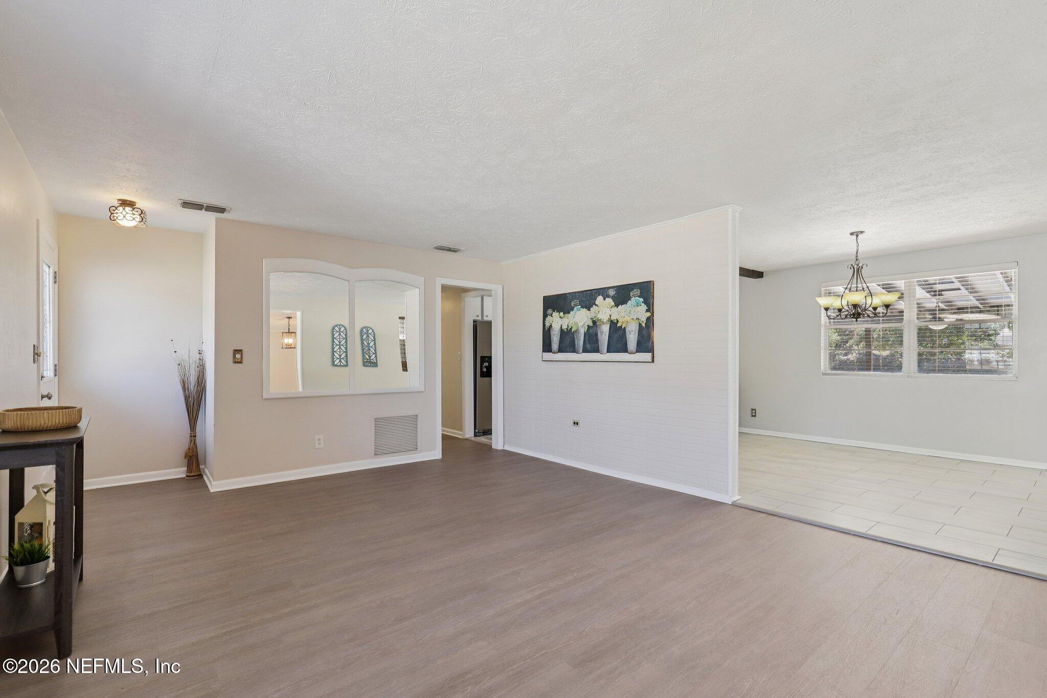 7004 Waikiki Road Jacksonville, FL 32216 - Photo 24 of 41 a view of an empty room with a window