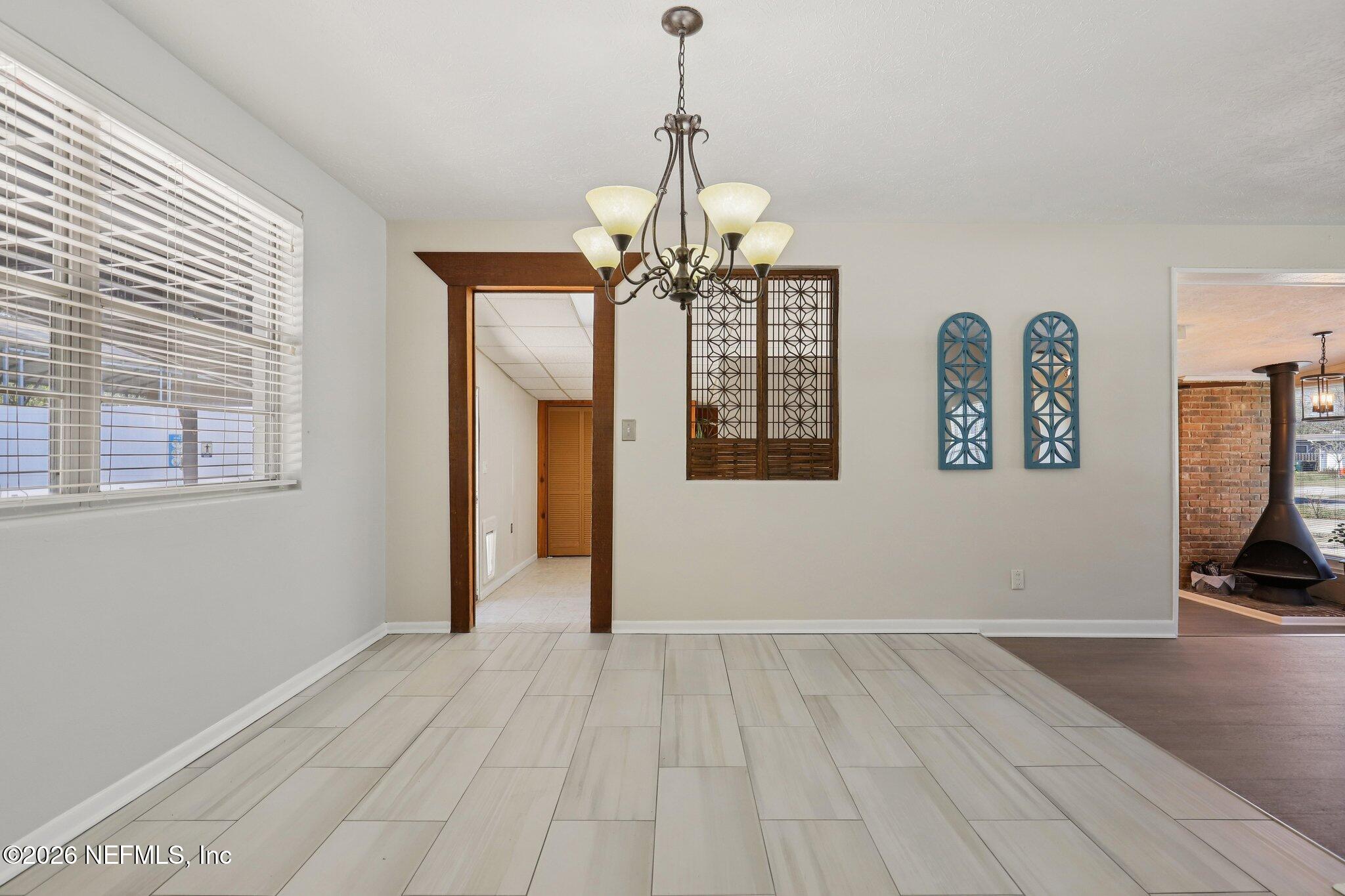 7004 Waikiki Road Jacksonville, FL 32216 - Photo 26 of 41 a view of a room with window and hardwood floor