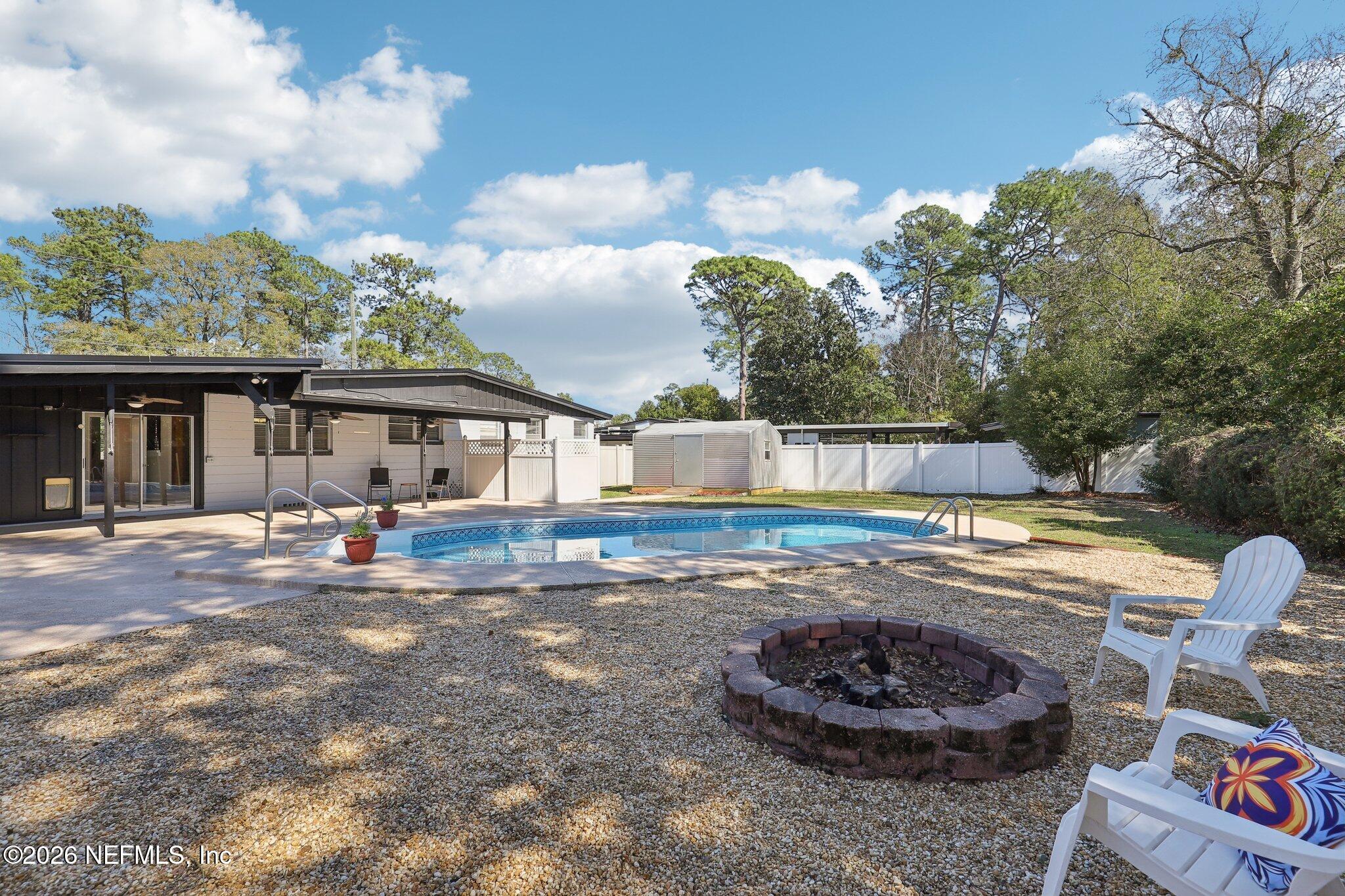 7004 Waikiki Road Jacksonville, FL 32216 - Photo 3 of 41 a view of a house with backyard and sitting area