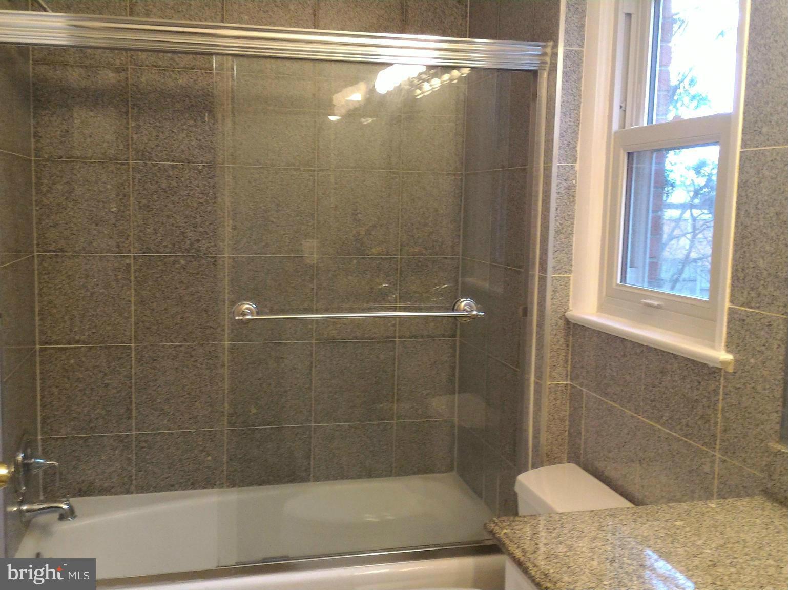 16512 Walnut Hill Road Gaithersburg, MD 20877 - Photo 16 of 20 a bathroom with a shower