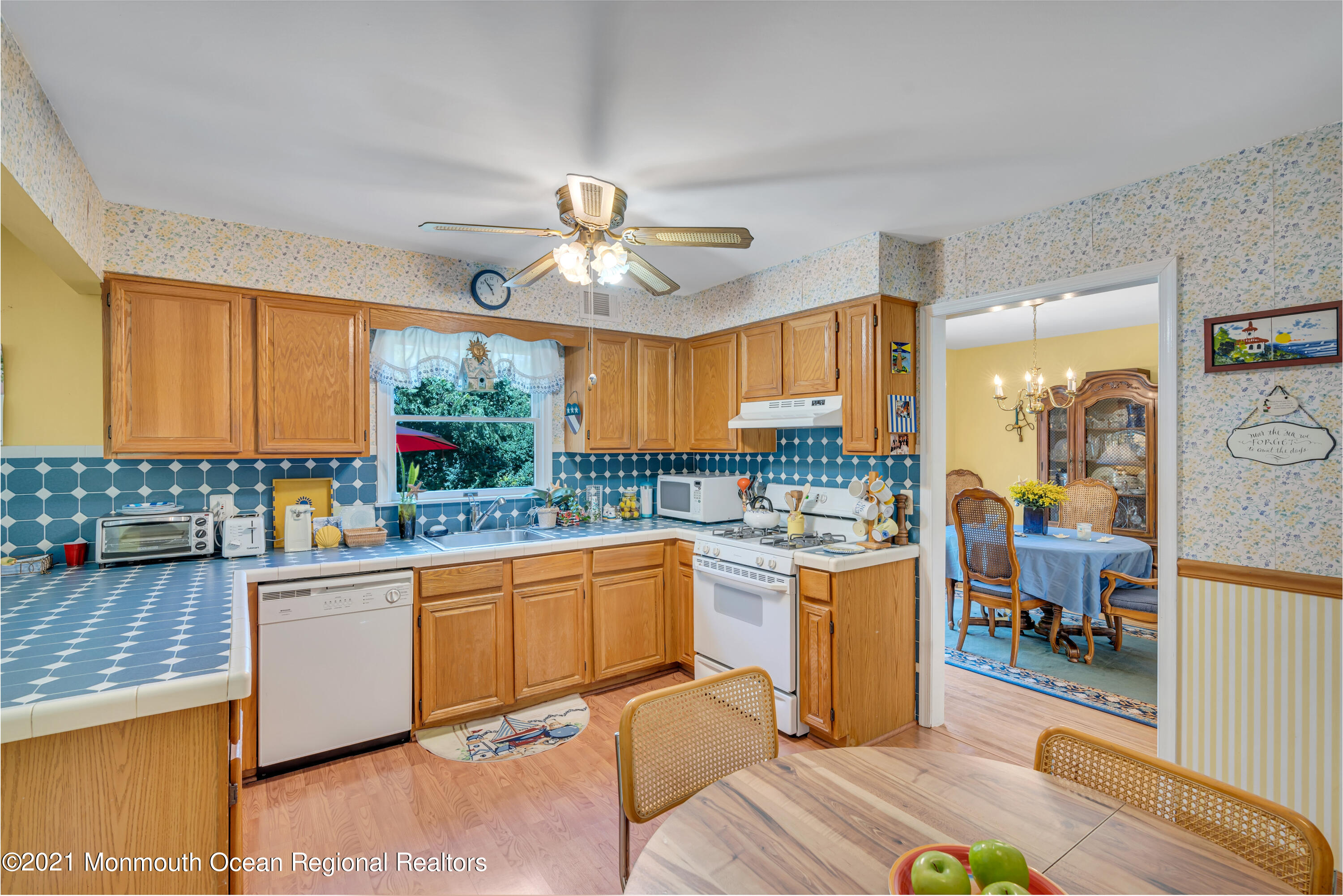 2221 Old Mill Road Spring Lake Heights, NJ 07762 - Photo 13 of 50 a kitchen with stainless steel appliances granite countertop a stove and a refrigerator
