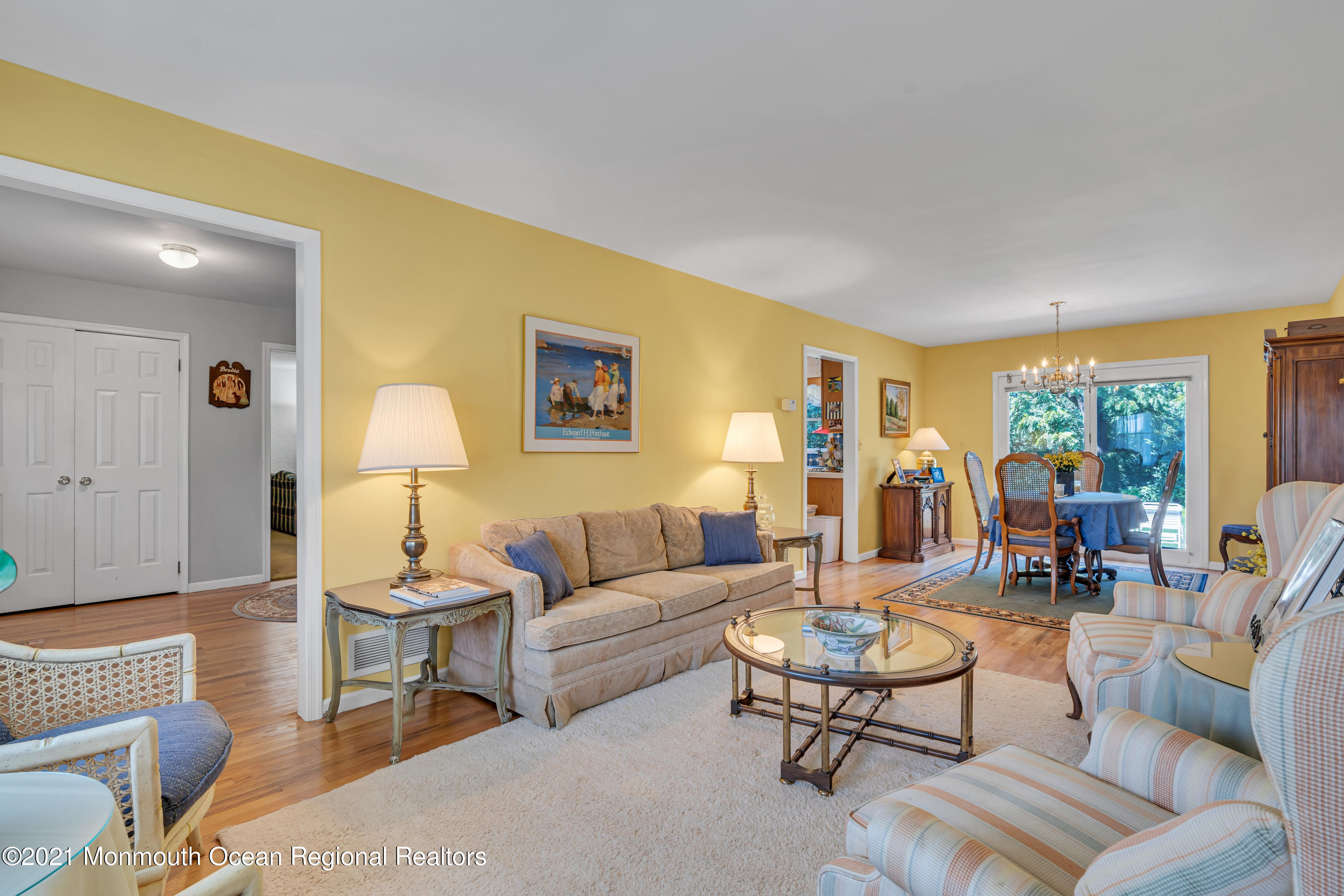 2221 Old Mill Road Spring Lake Heights, NJ 07762 - Photo 17 of 50 a living room with furniture a lamp next to a window