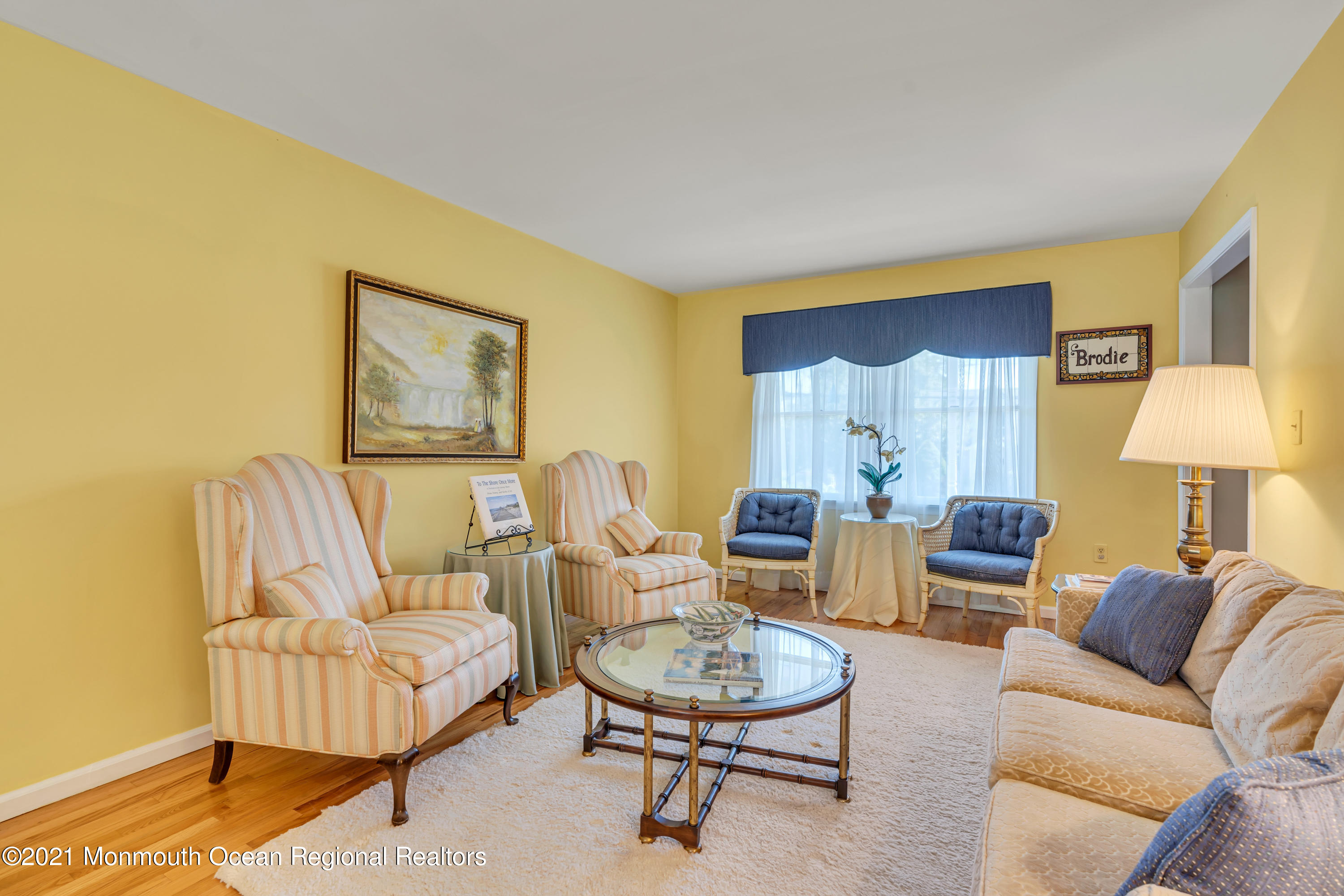 2221 Old Mill Road Spring Lake Heights, NJ 07762 - Photo 19 of 50 a living room with furniture and a lamp