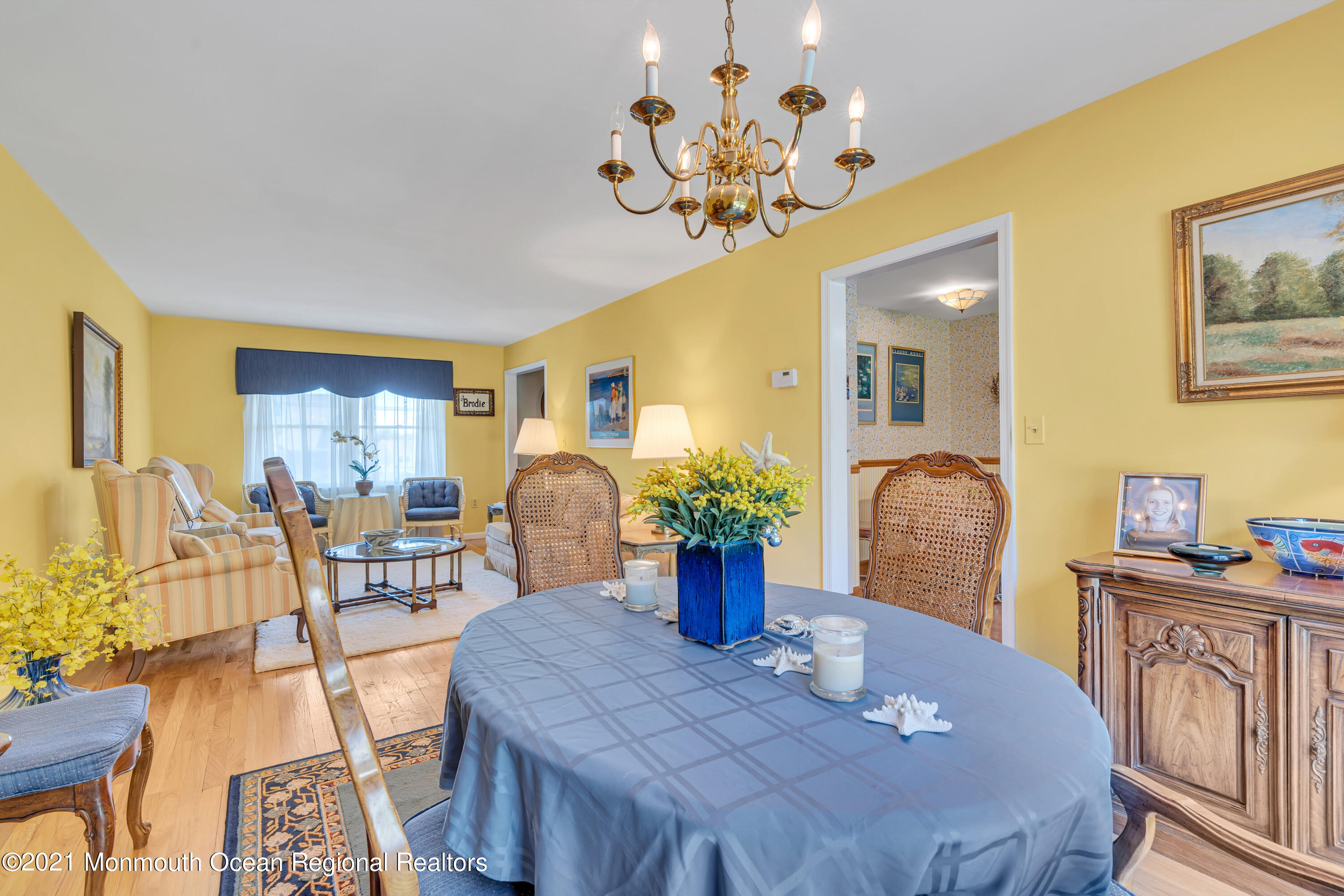 2221 Old Mill Road Spring Lake Heights, NJ 07762 - Photo 22 of 50 a view of a dining room with furniture and chandelier