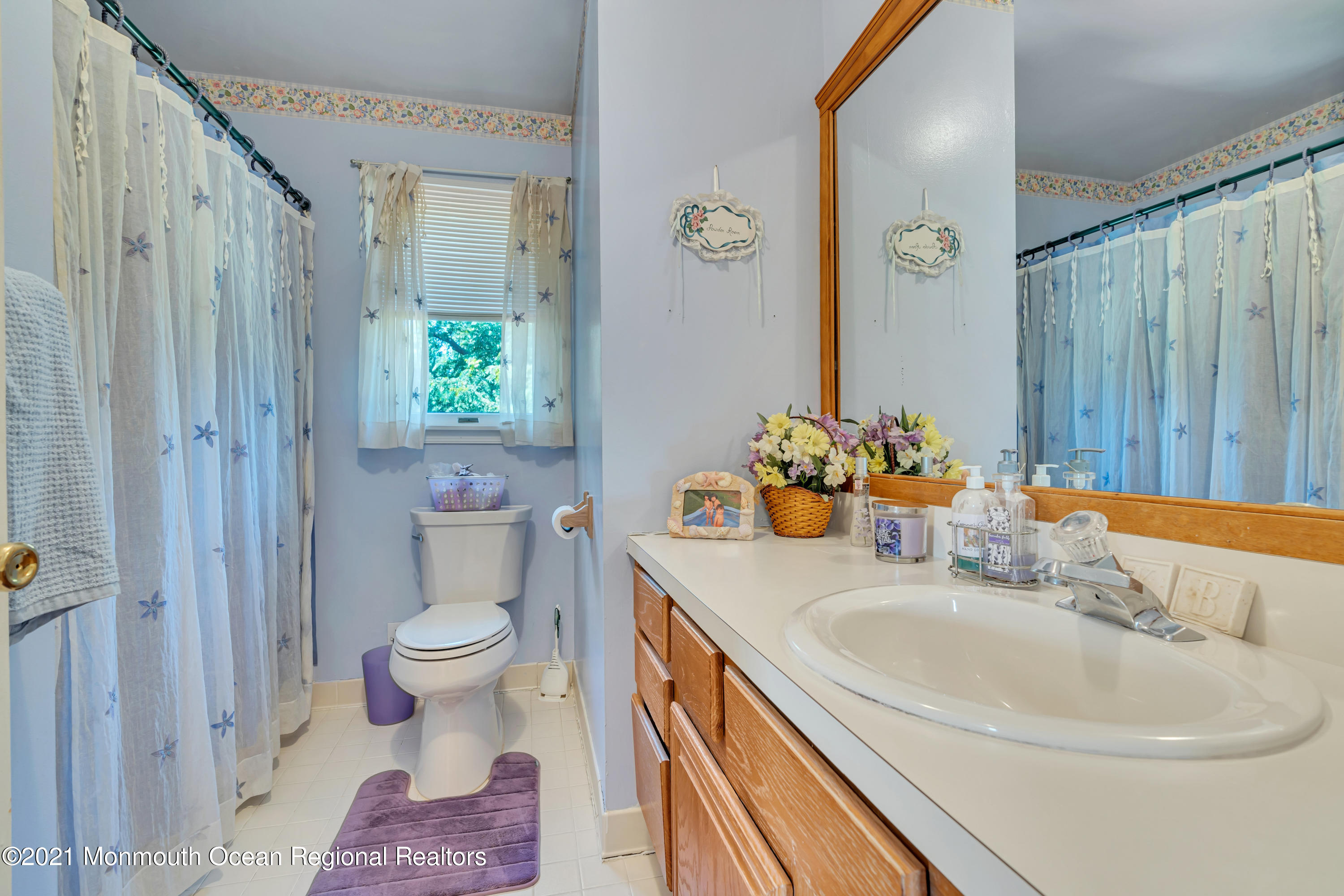 2221 Old Mill Road Spring Lake Heights, NJ 07762 - Photo 28 of 50 a bathroom with a sink toilet and shower