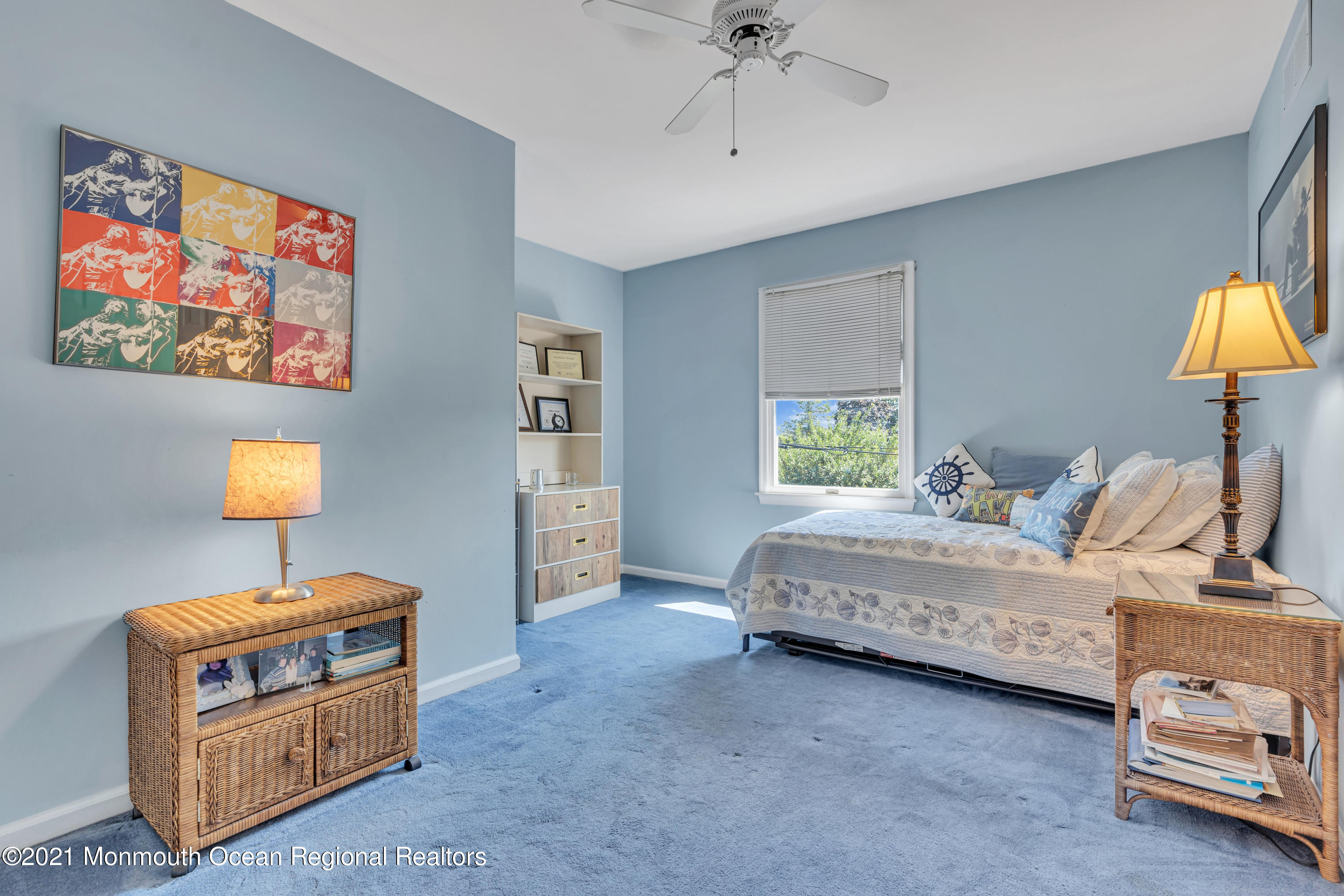 2221 Old Mill Road Spring Lake Heights, NJ 07762 - Photo 29 of 50 a spacious bedroom with a bed and a lamp on dresser