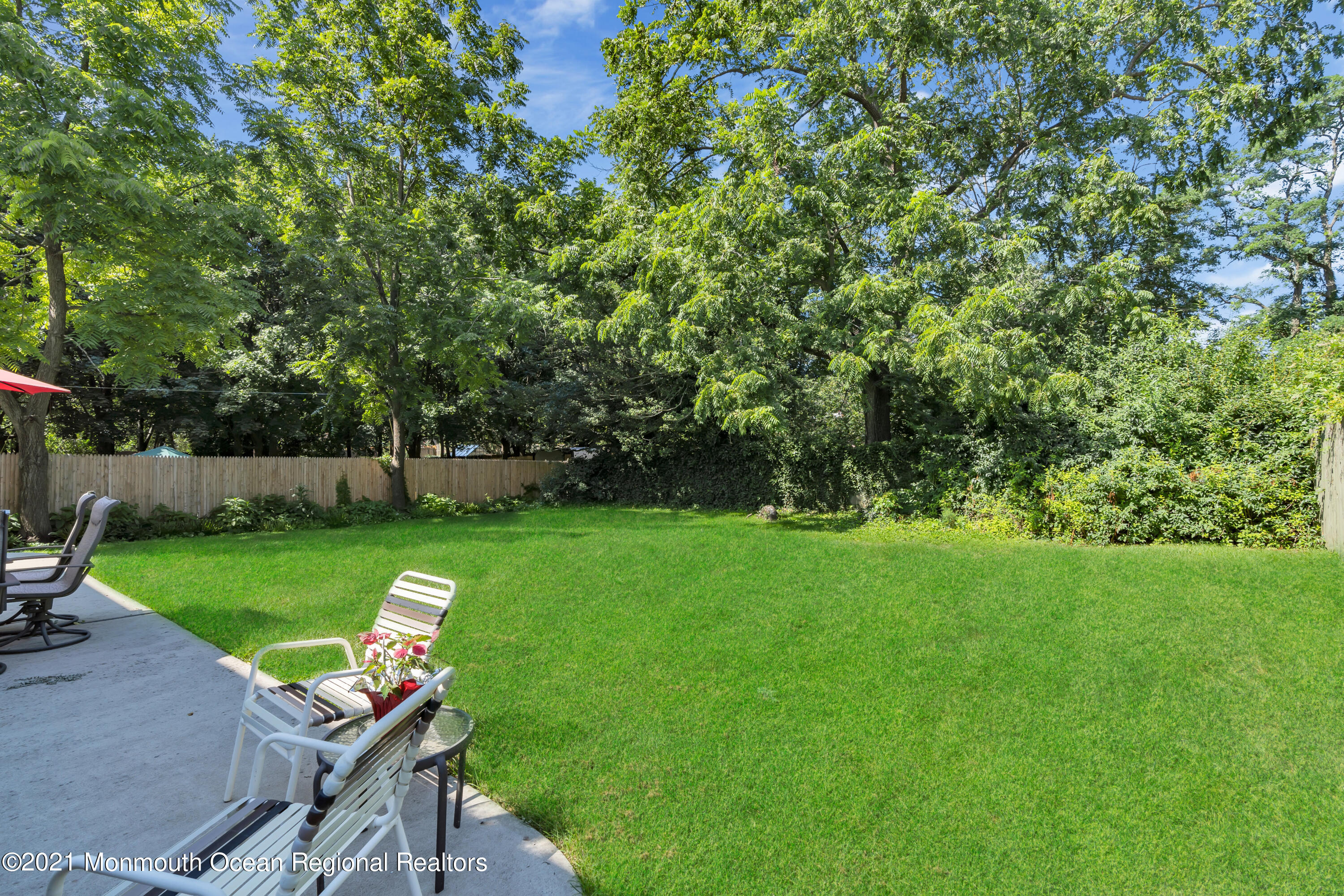 2221 Old Mill Road Spring Lake Heights, NJ 07762 - Photo 35 of 50 a view of a chair and table in the garden