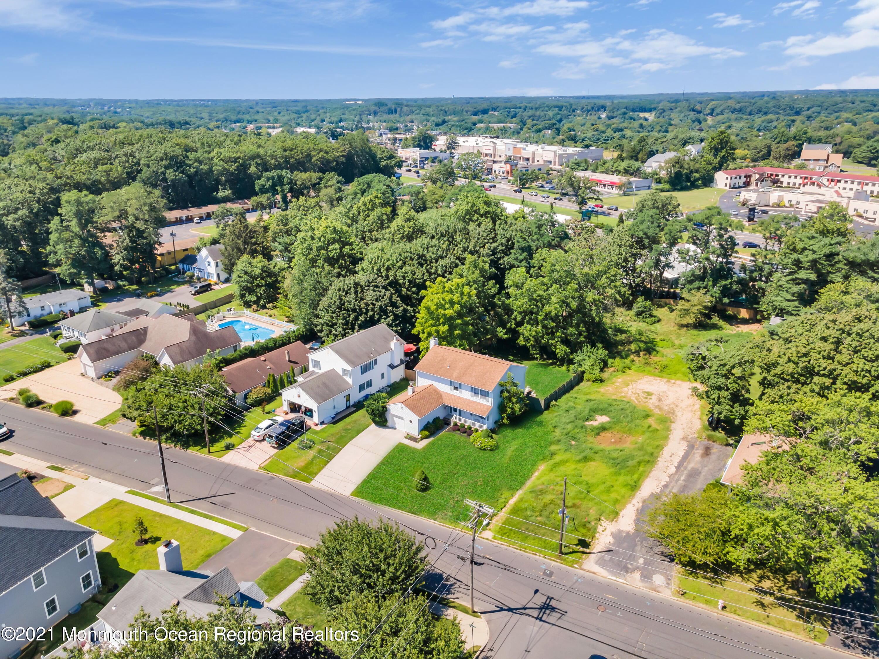 2221 Old Mill Road Spring Lake Heights, NJ 07762 - Photo 39 of 50 an aerial view of residential houses with outdoor space and street view