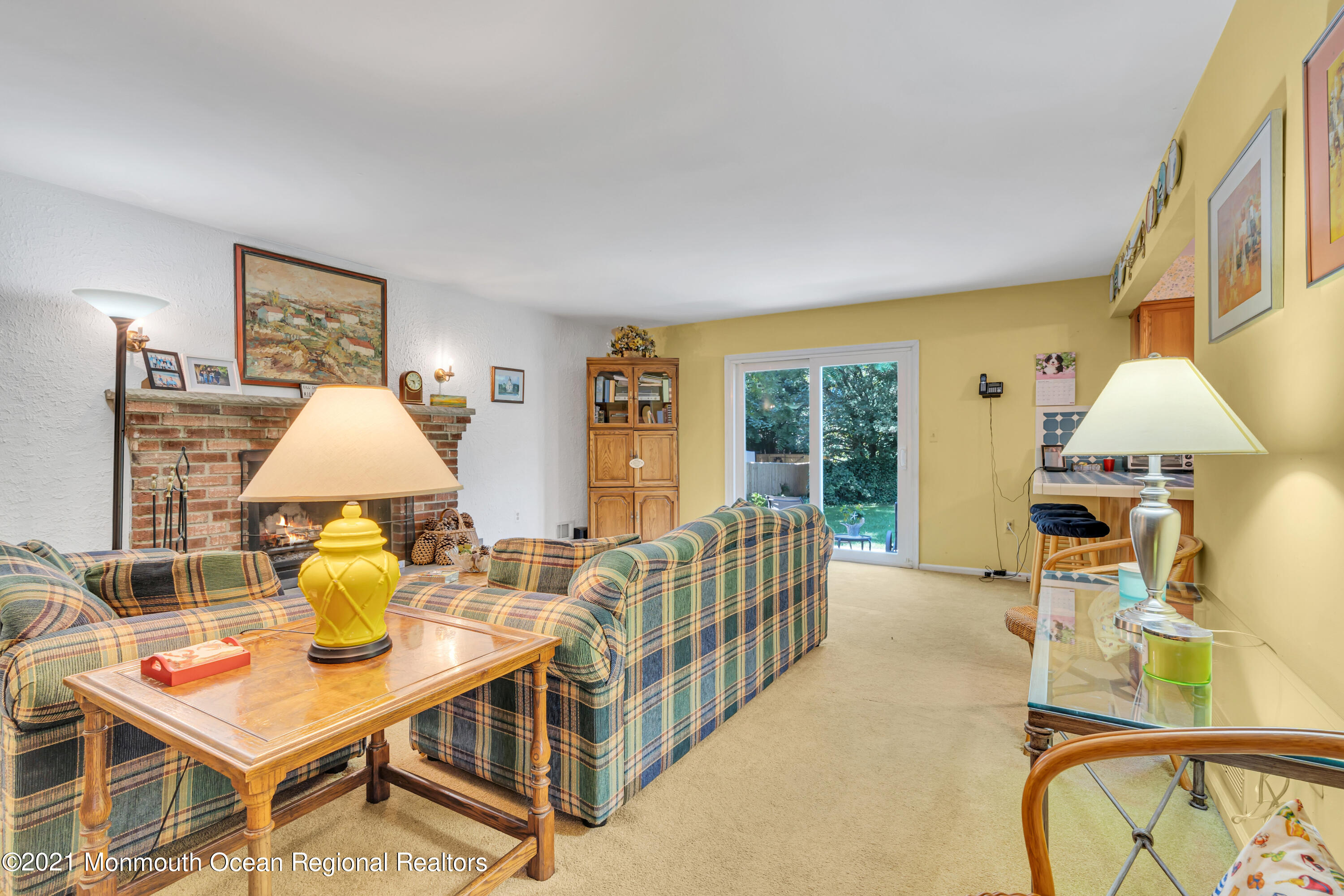 2221 Old Mill Road Spring Lake Heights, NJ 07762 - Photo 5 of 50 a living room with furniture and a table