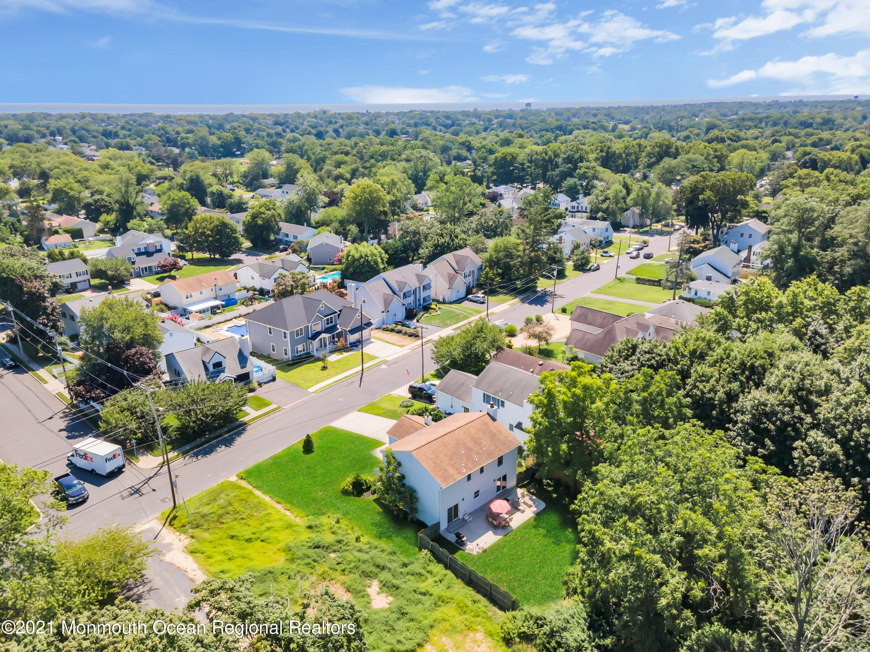 2221 Old Mill Road Spring Lake Heights, NJ 07762 - Photo 41 of 50 an aerial view of residential houses with outdoor space and swimming pool