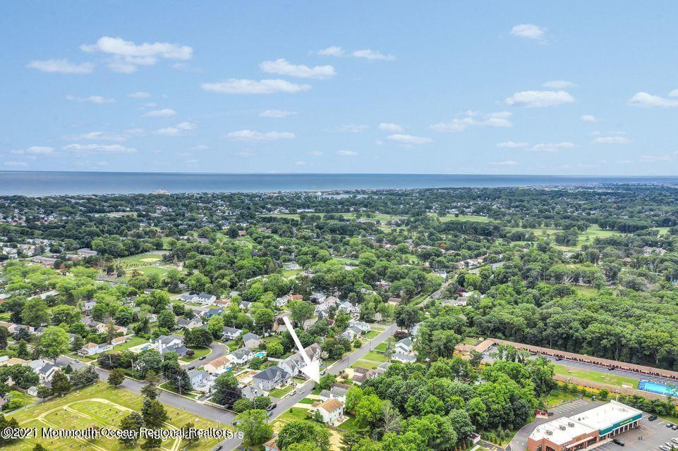 2221 Old Mill Road Spring Lake Heights, NJ 07762 - Photo 43 of 50 an aerial view of residential houses with outdoor space and trees