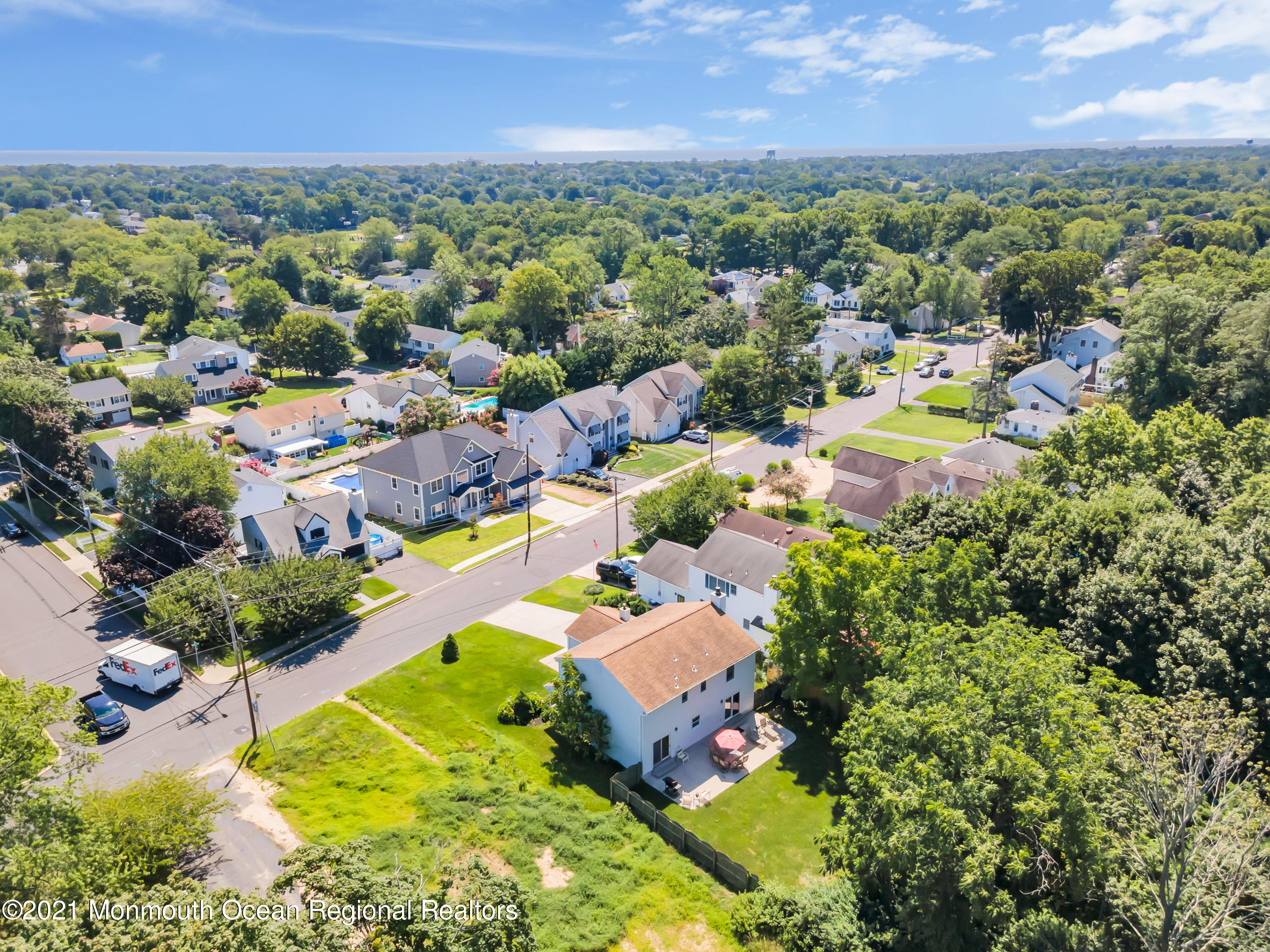2221 Old Mill Road Spring Lake Heights, NJ 07762 - Photo 50 of 50 an aerial view of residential houses with outdoor space and swimming pool