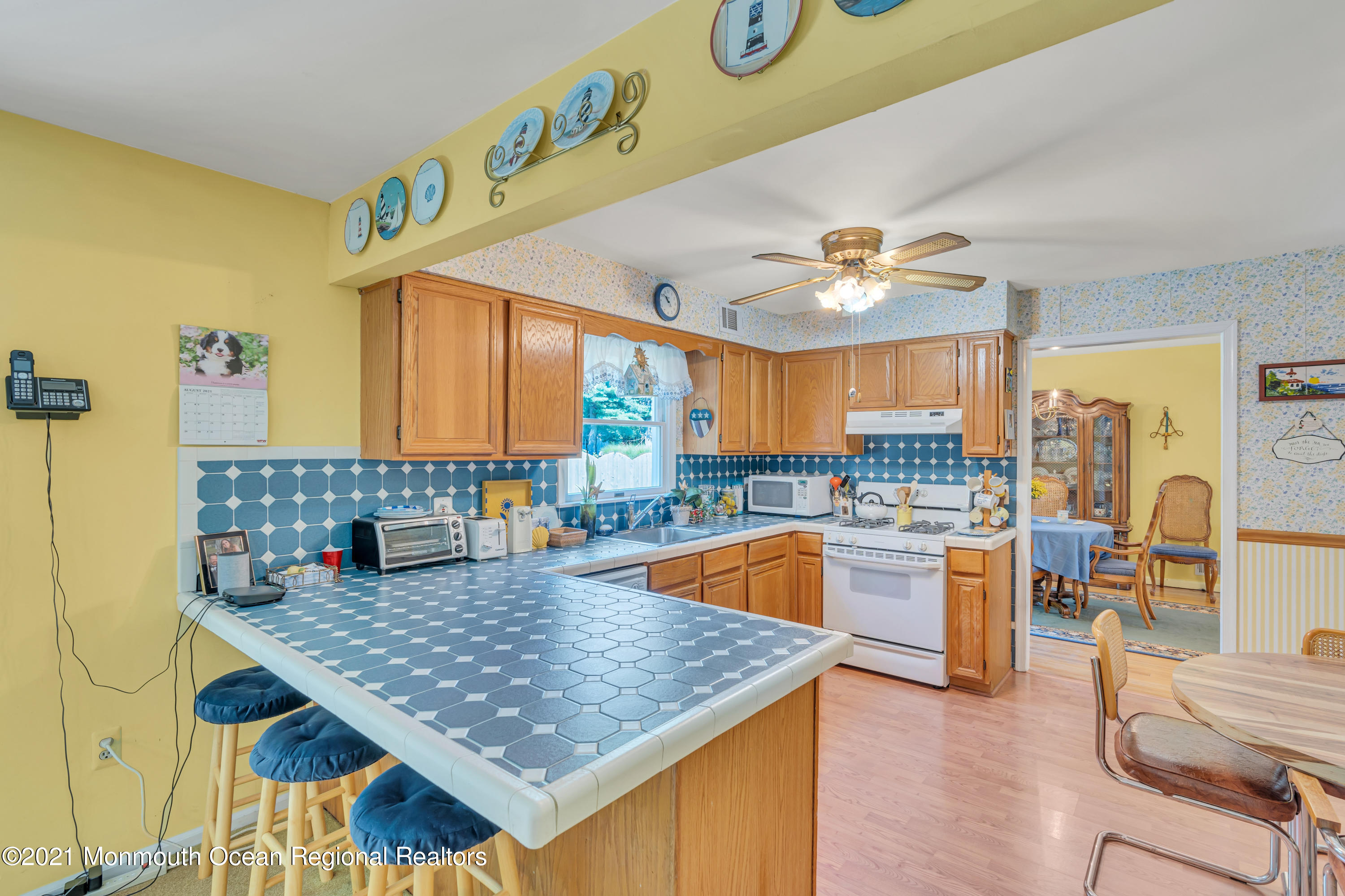 2221 Old Mill Road Spring Lake Heights, NJ 07762 - Photo 9 of 50 a kitchen with a table and chairs in it