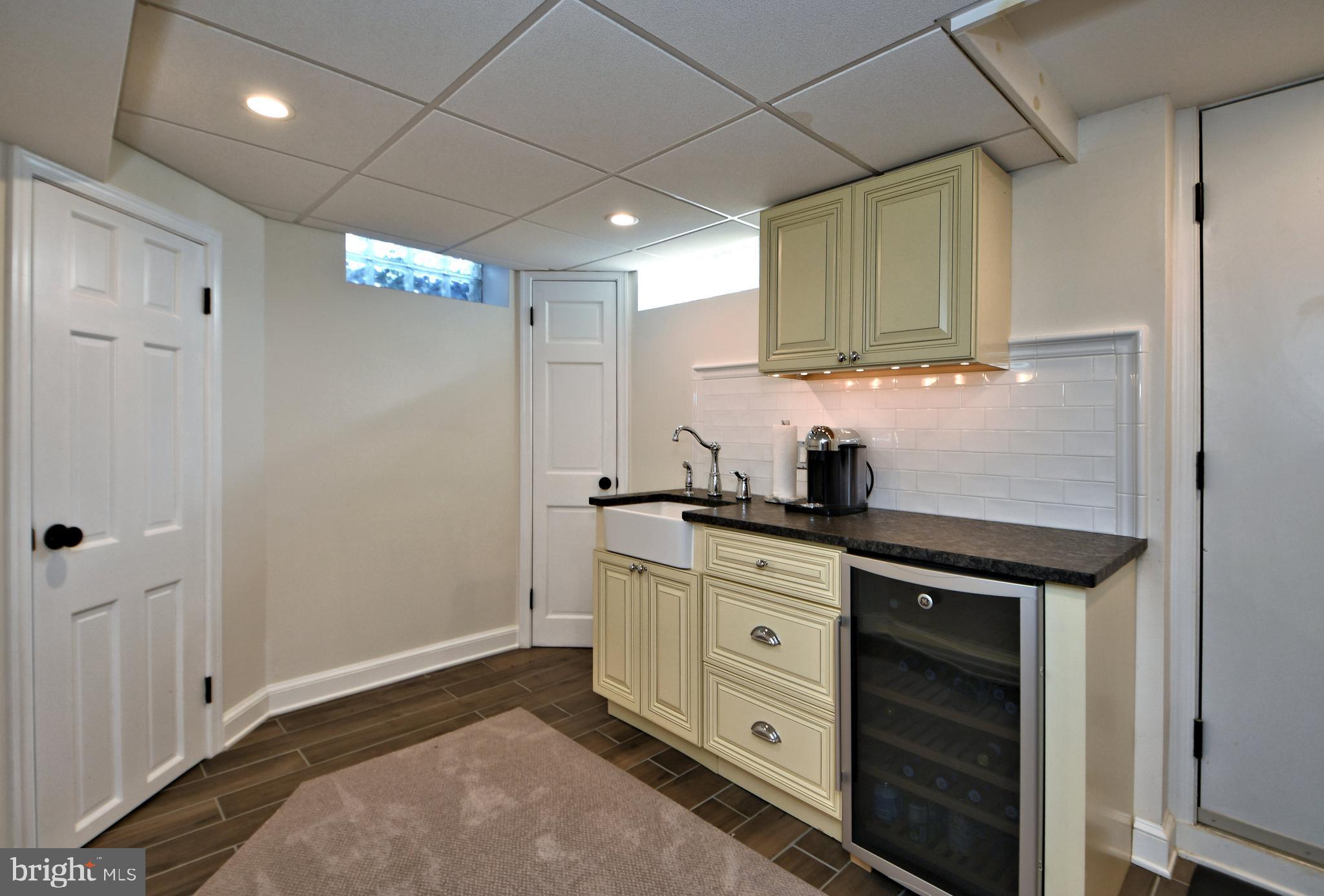 502 Marks Road Oreland, PA 19075 - Photo 53 of 62 Basement wet bar, outside access.