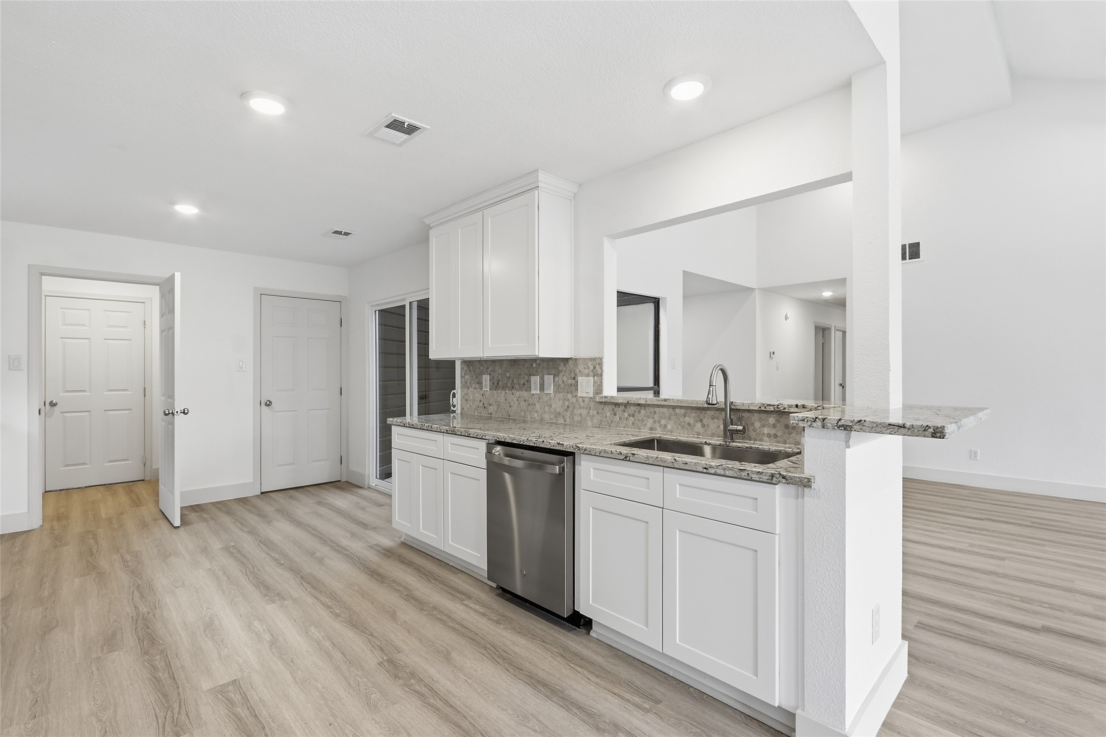 19110 Baton Pass Humble, TX 77346 - Photo 13 of 41 a bathroom with a sink and a mirror