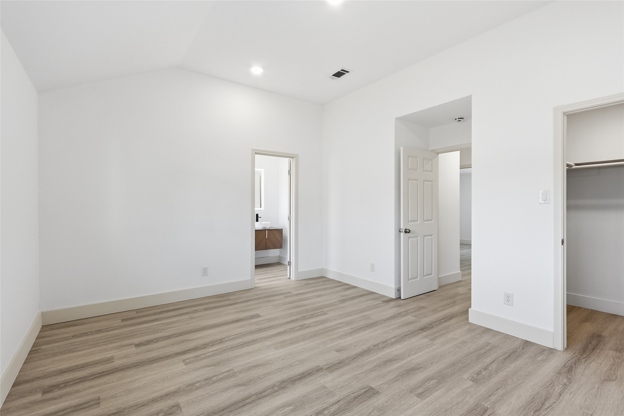 19110 Baton Pass Humble, TX 77346 - Photo 25 of 41 a view of an empty room with wooden floor