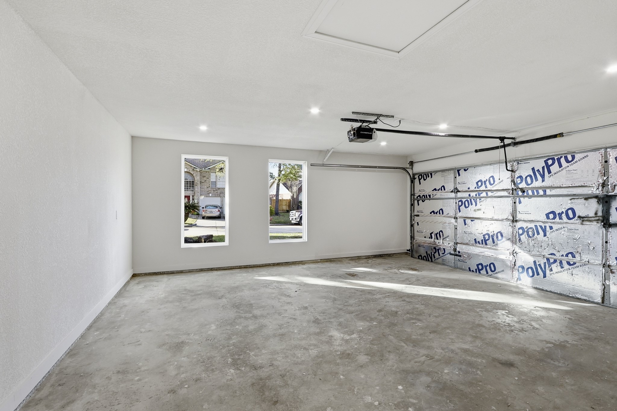 19110 Baton Pass Humble, TX 77346 - Photo 36 of 41 Huge garage with windows to the front yard.