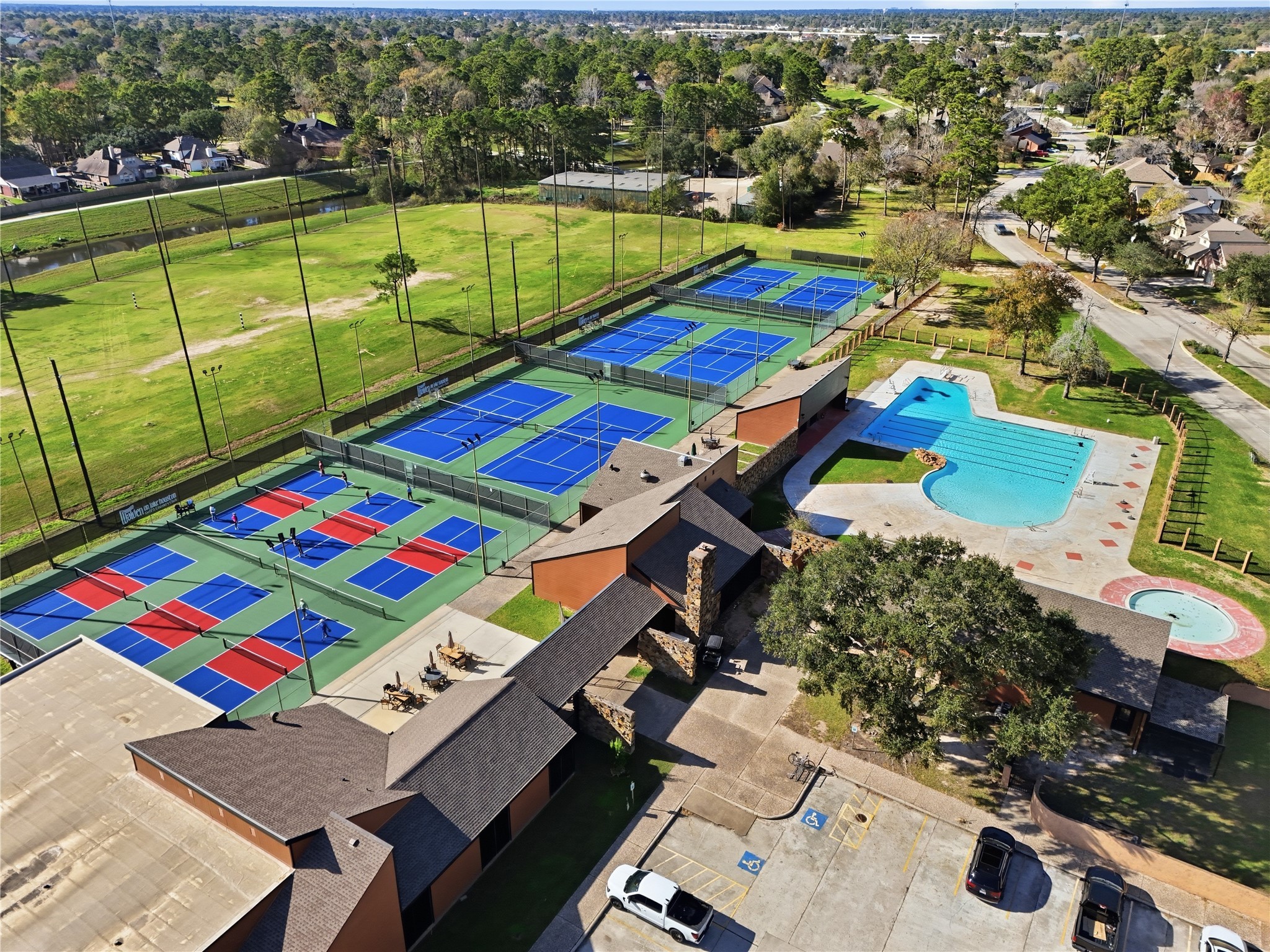 19110 Baton Pass Humble, TX 77346 - Photo 40 of 41 an aerial view of a pool patio patio and outdoor seating