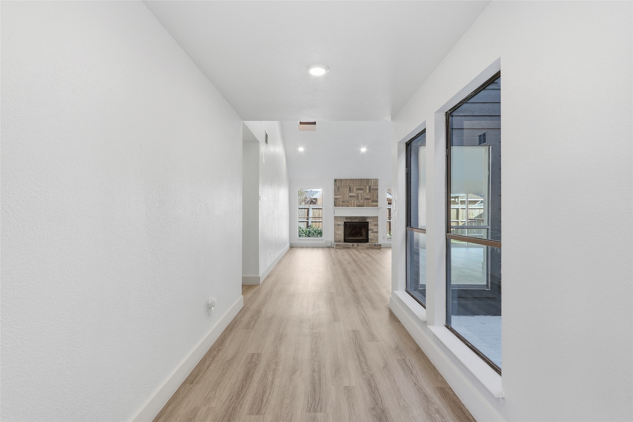 19110 Baton Pass Humble, TX 77346 - Photo 5 of 41 a view of hallway with wooden floor