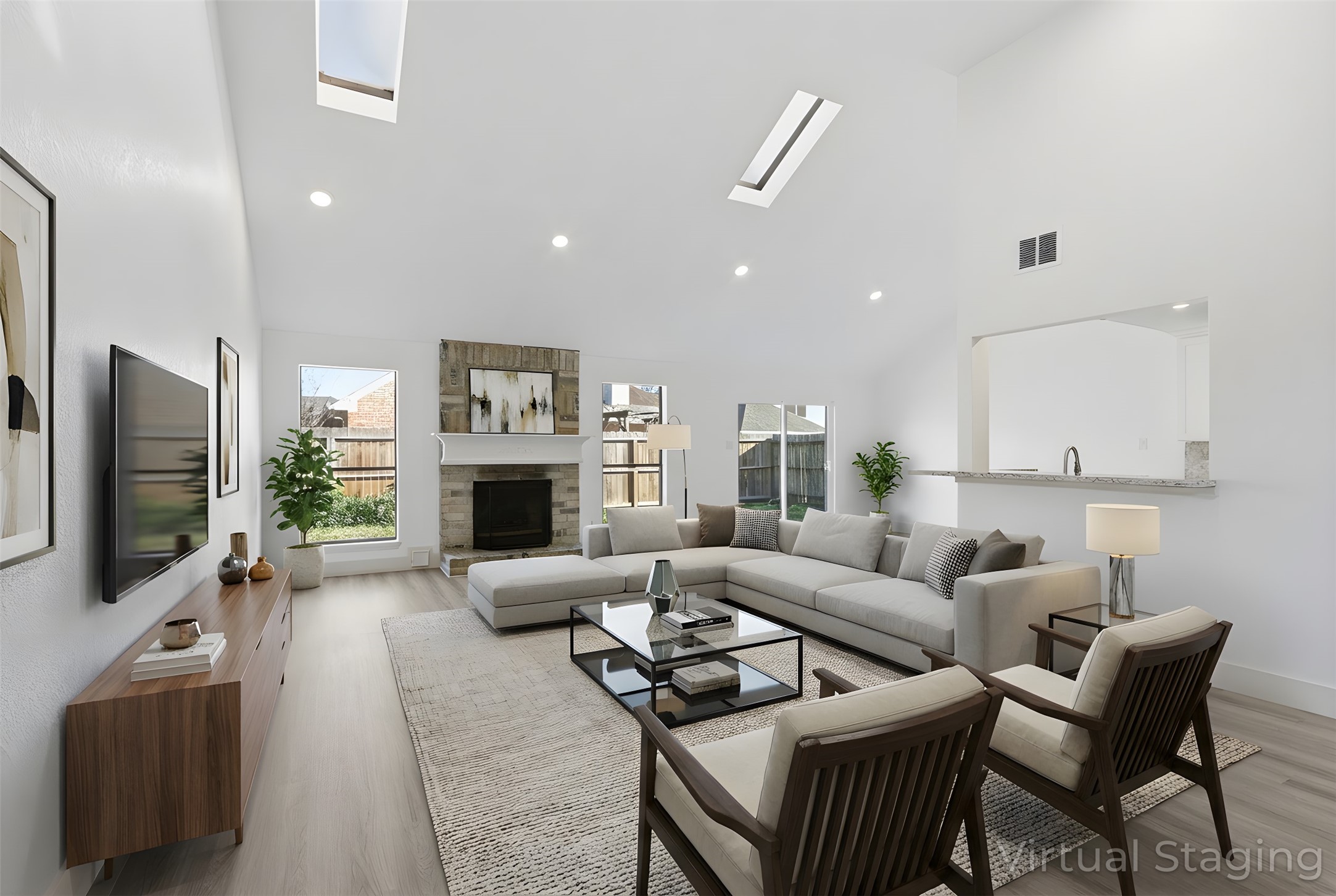 19110 Baton Pass Humble, TX 77346 - Photo 6 of 41 a living room with furniture a flat screen tv and a fireplace
