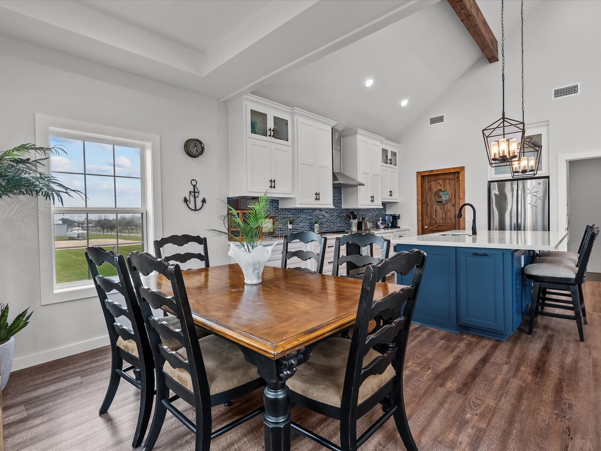 822 West 2nd Street Freeport, TX 77541 - Photo 17 of 46 a dining room with furniture and window