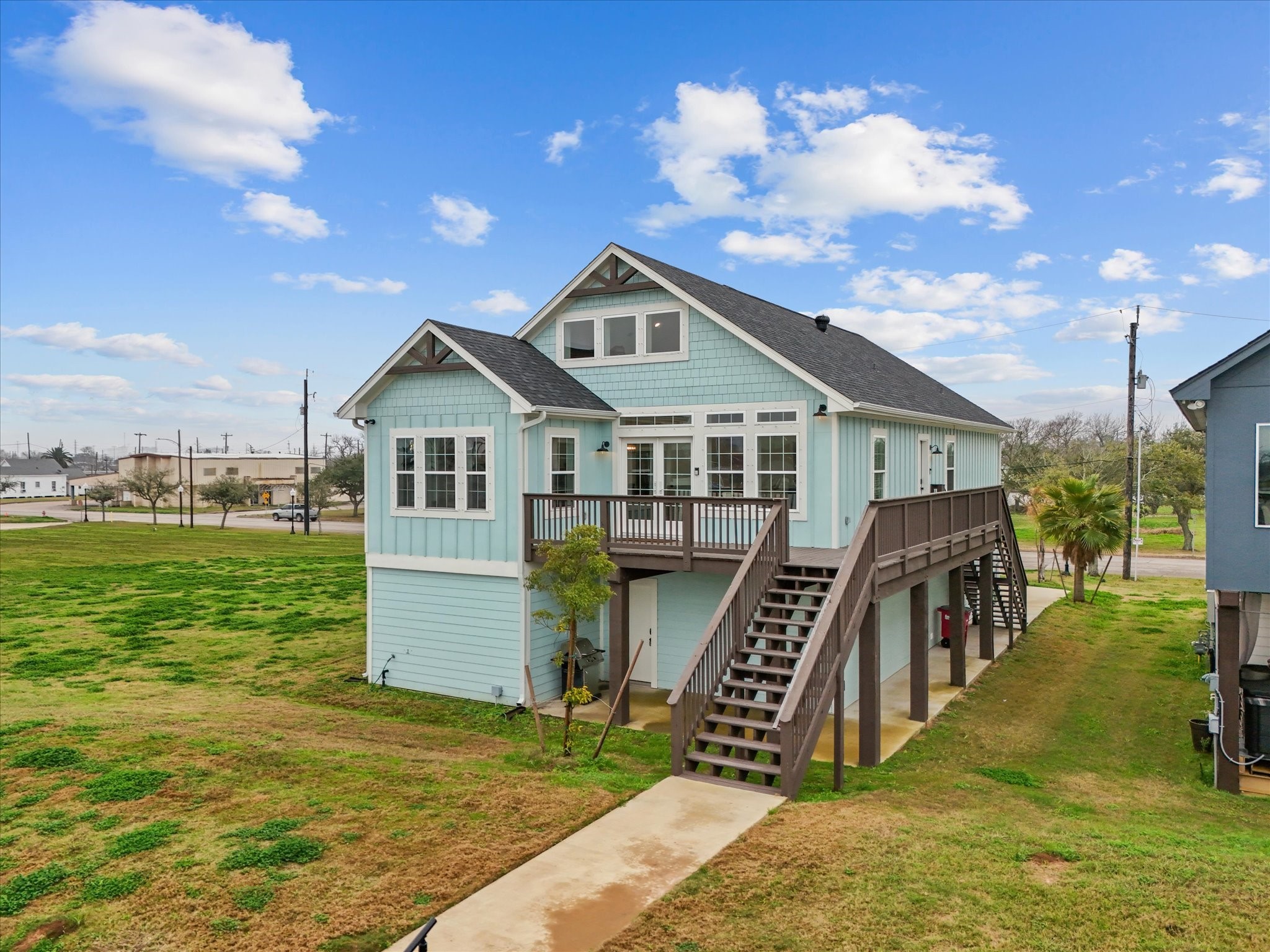 822 West 2nd Street Freeport, TX 77541 - Photo 2 of 46 a front view of a house with a yard