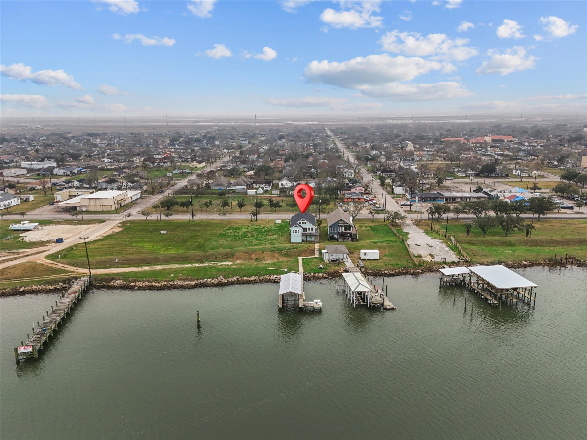 822 West 2nd Street Freeport, TX 77541 - Photo 3 of 46 an aerial view of a houses with swimming pool and outdoor space