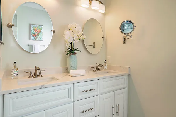 a bathroom with a bathtub and shower