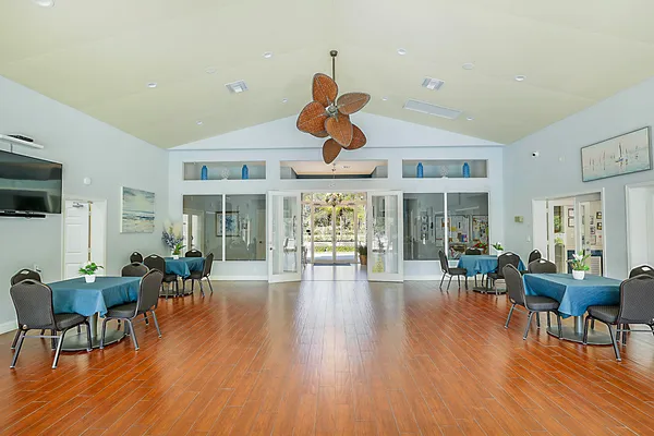 a view of dining room with furniture window and wooden floor