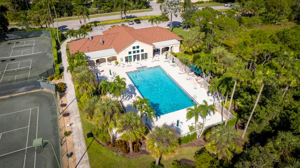 an aerial view of residential house with outdoor space