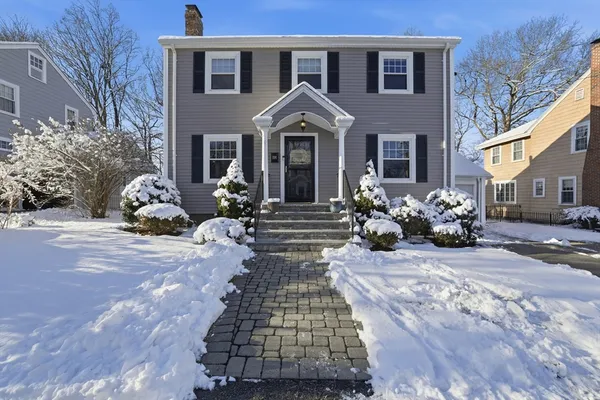 a front view of a house with outdoor space