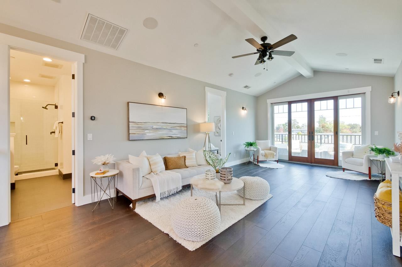 10326 Prune Tree Lane Cupertino, CA 95014 - Photo 12 of 95 a living room with furniture and a large window