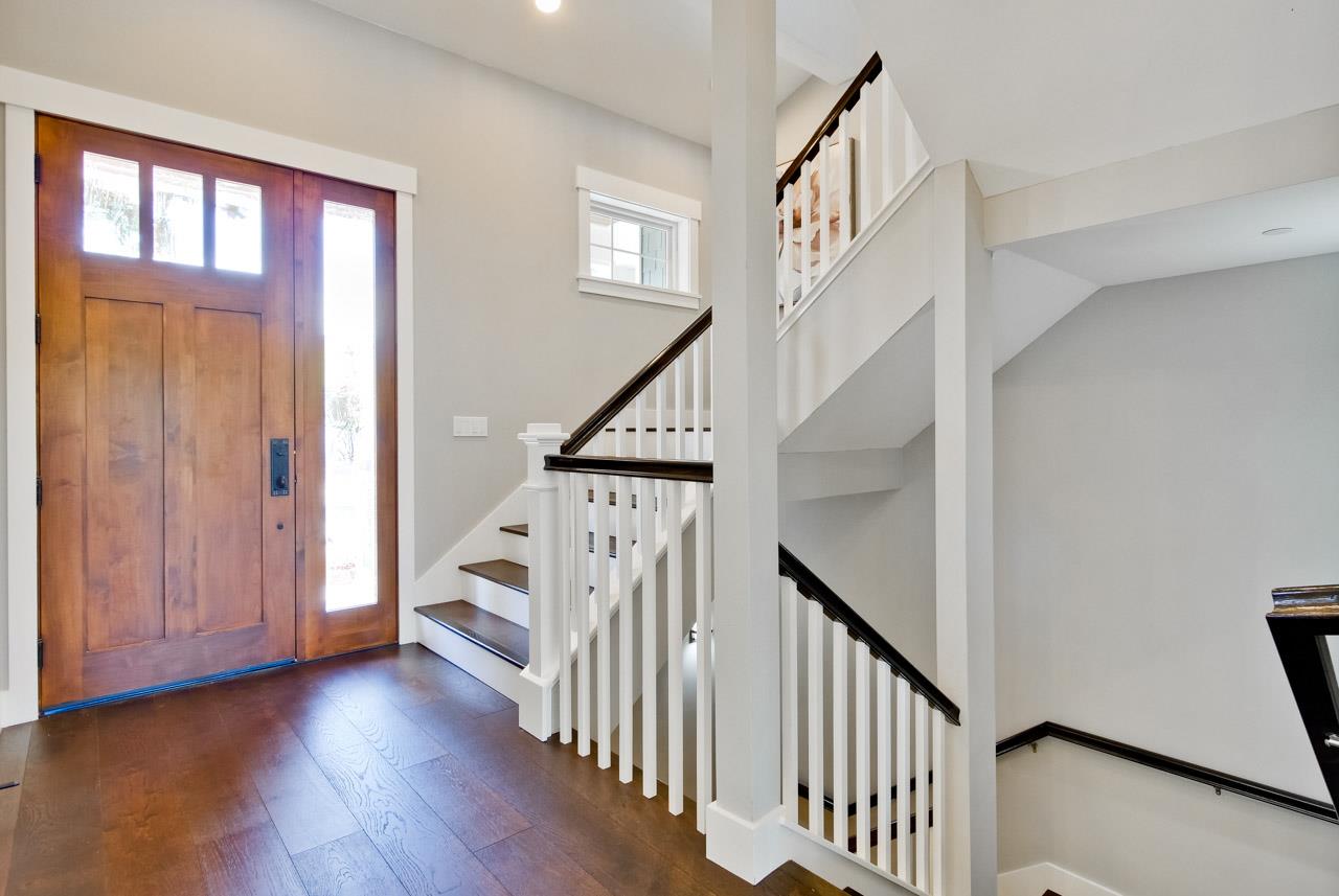 10326 Prune Tree Lane Cupertino, CA 95014 - Photo 17 of 95 a view of entryway with wooden floor and stairs