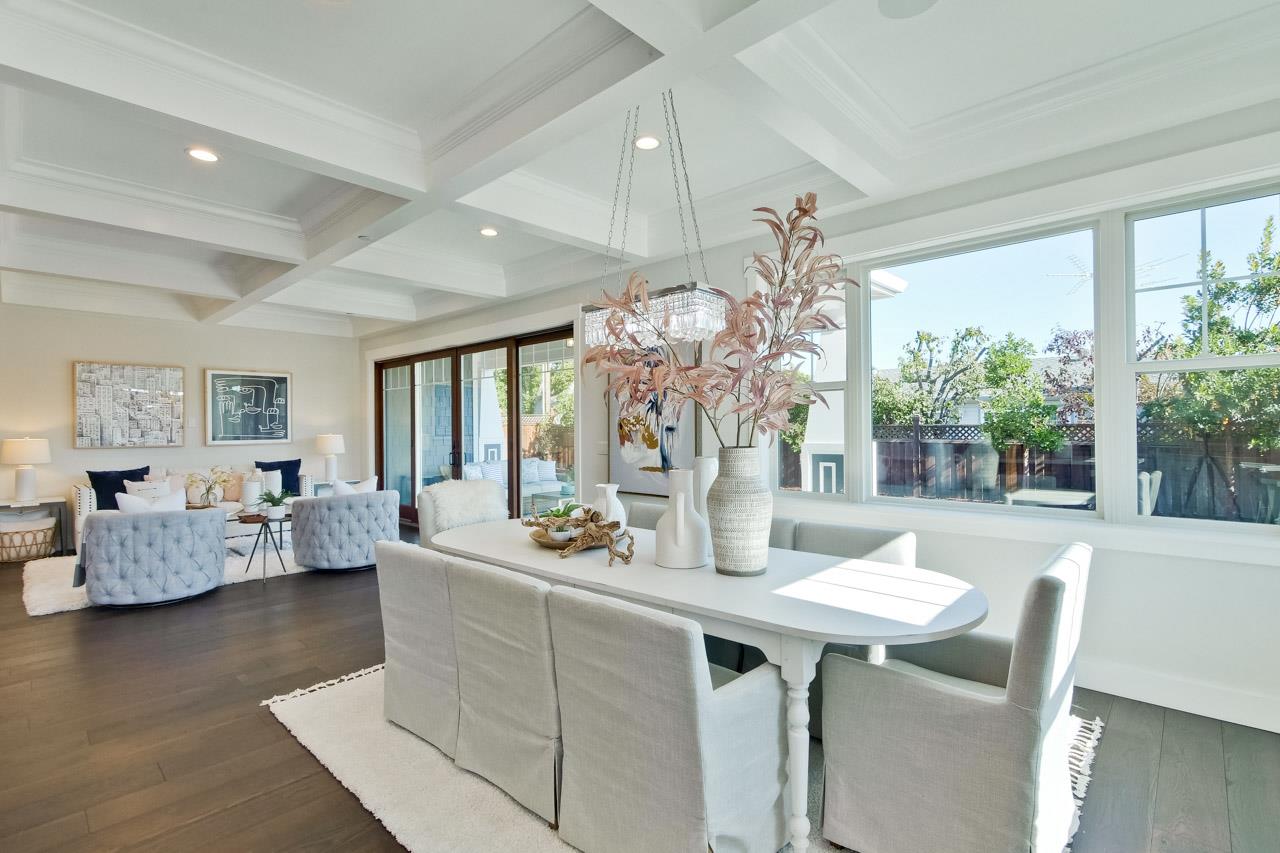 10326 Prune Tree Lane Cupertino, CA 95014 - Photo 20 of 95 a view of a dining room with furniture wooden floor and chandelier