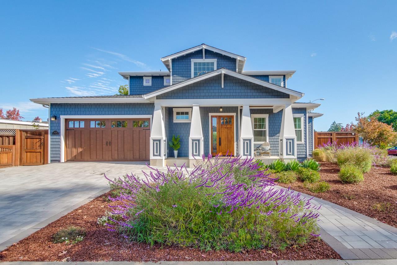 10326 Prune Tree Lane Cupertino, CA 95014 - Photo 27 of 95 a front view of a house with garden